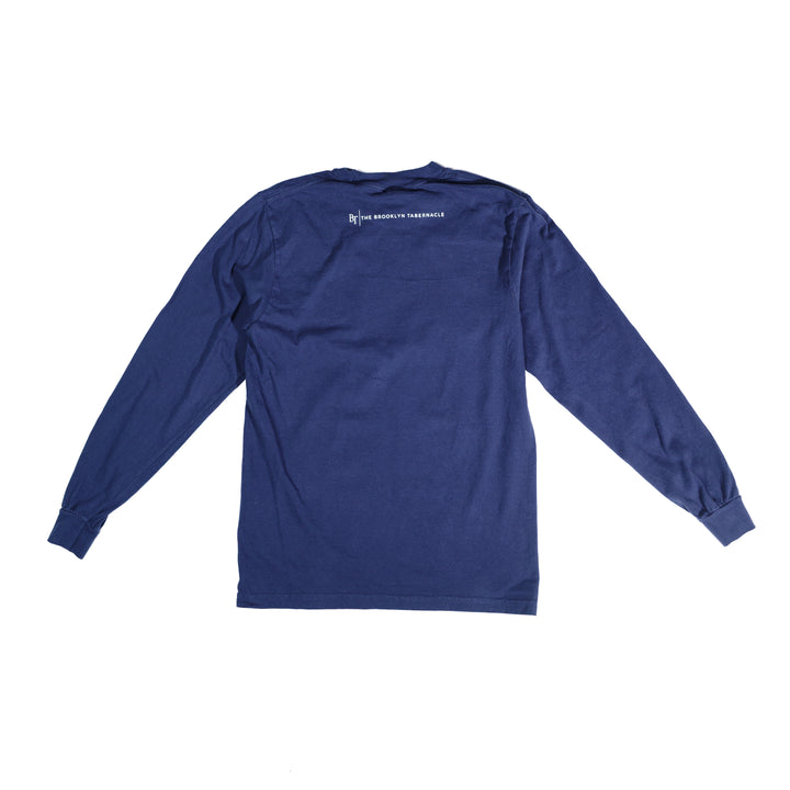 Blue long-sleeve shirt with the Brooklyn Tabernacle logo in white letters printed on it